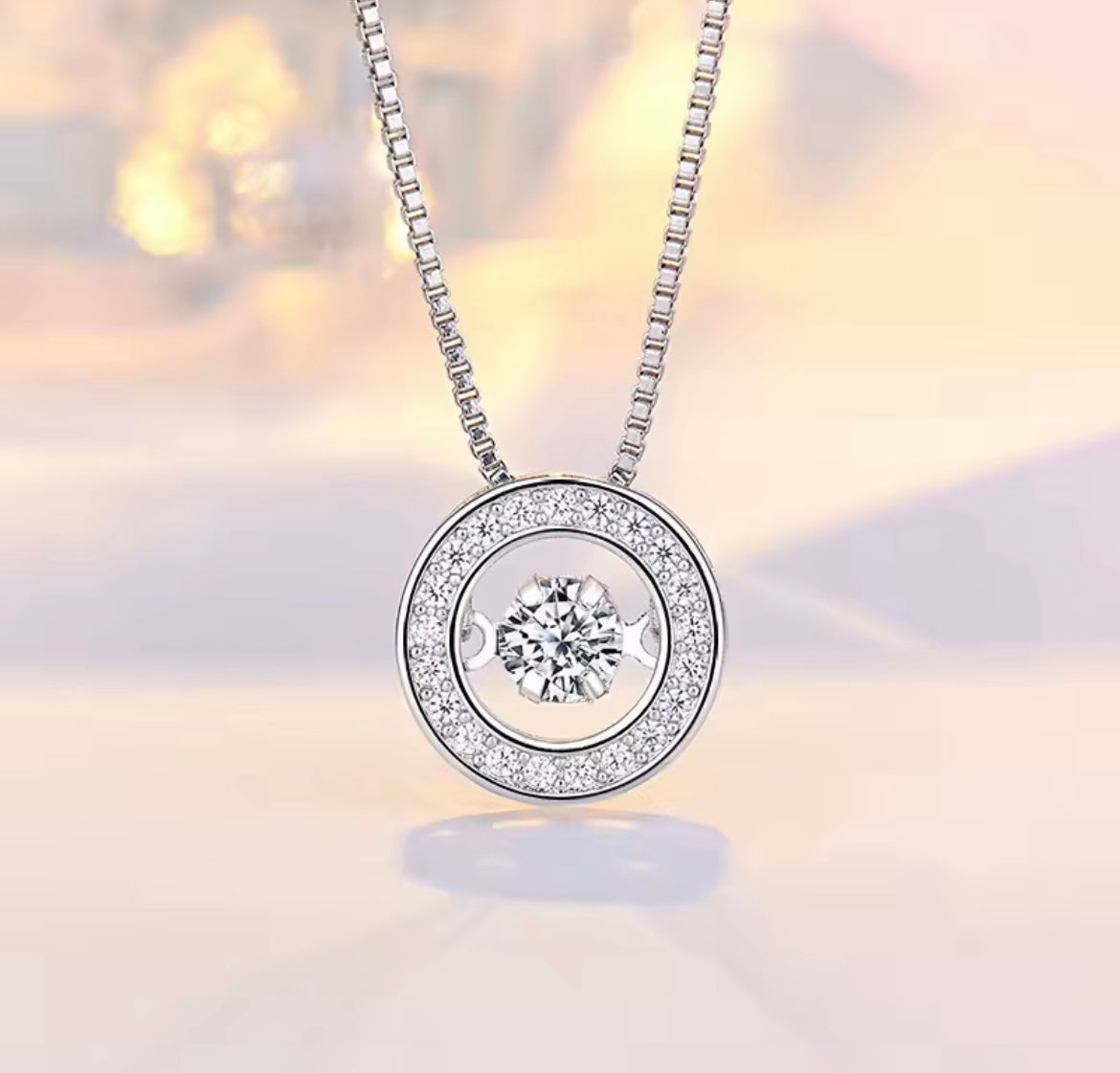925 Sterling Silver Round Rotatable Dance Zircon Pendant Necklace.