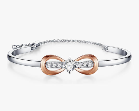 Two-toned 18k white gold infinity bow bracelet