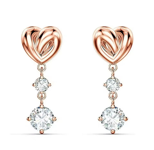 Rose gold heart dangly stud earrings